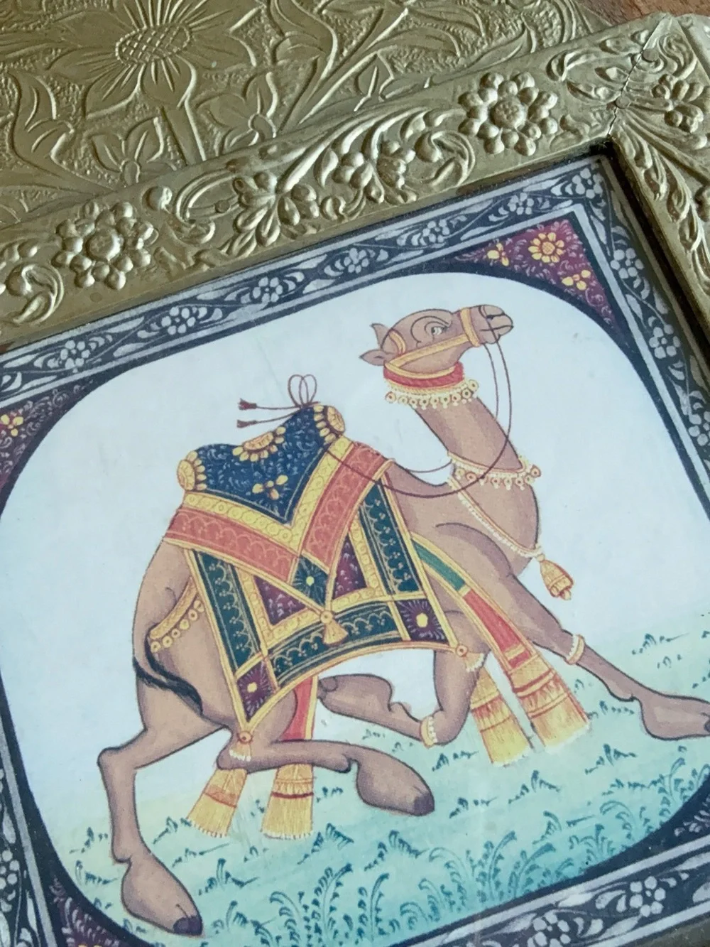 Indian brass-trimmed wall key holder featuring an ornate, miniature-style camel